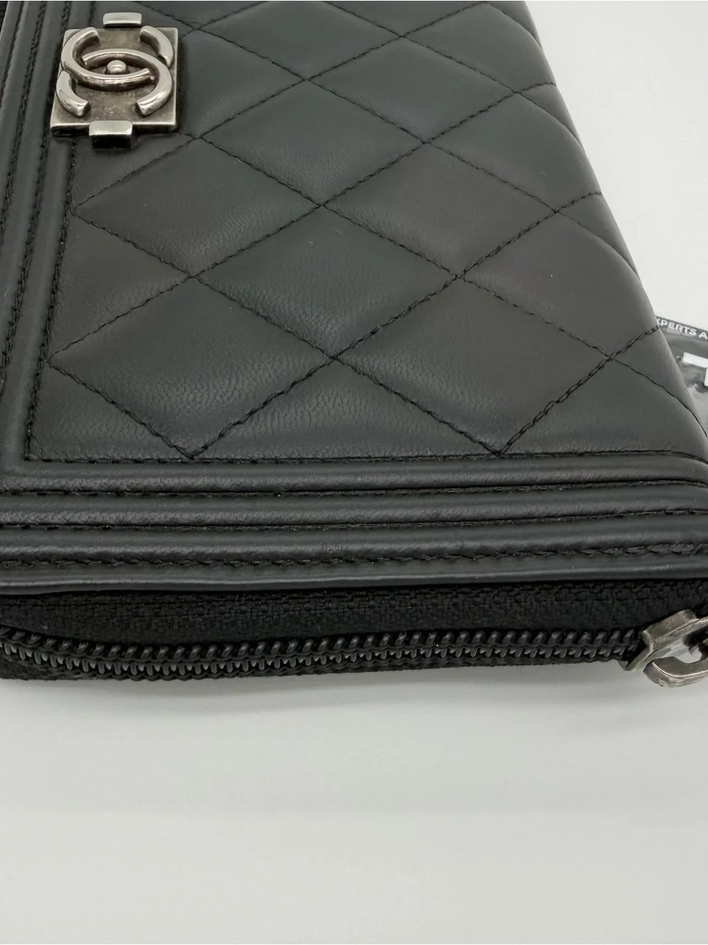 CHANEL Black Quilted Zip-Around Wallet with Silver CC Lock